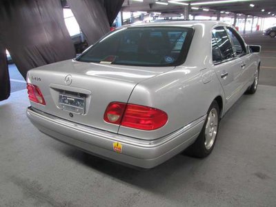 Бампер задний Mercedes Benz E430 W210